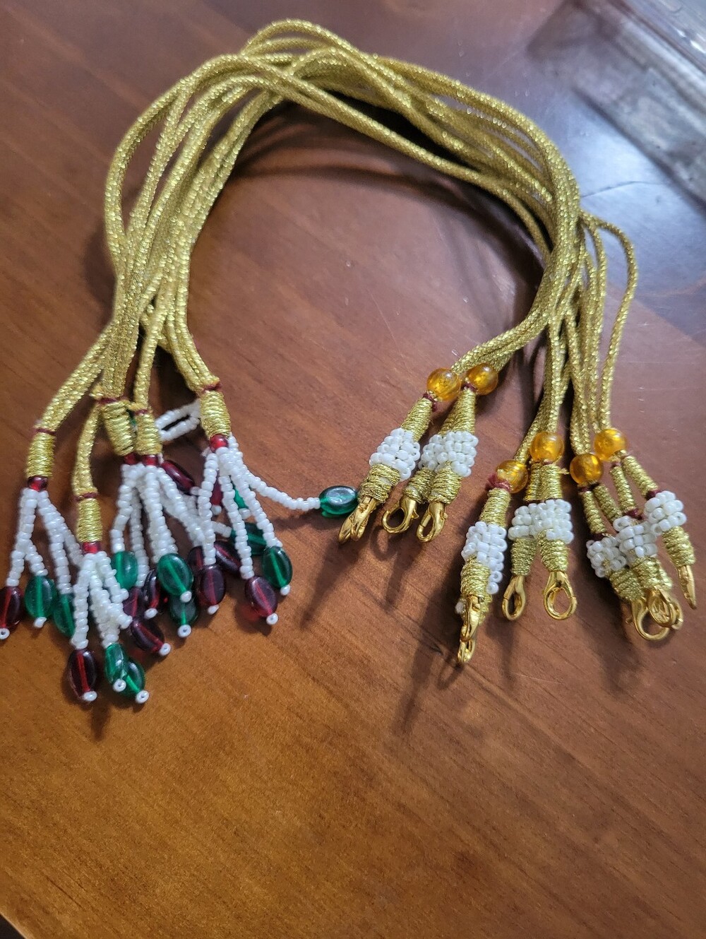 Gold Cord Necklace with Green and Red Bead Accents